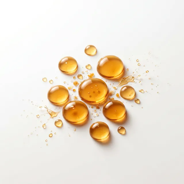 Drops of amber apple cider vinegar